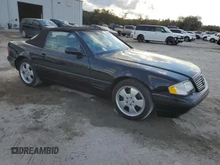 1999 Mercedes-Benz SL-Class with VIN WDBFA68F0XF186163, listed as a Copart auction lot 82669544 with 184,054 mi miles and Salvage Title. Bid and sale history available at carsss.com. Image 4.