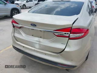 2018 Ford Fusion SE z VIN 3FA6P0H75JR176394, wystawiony jako IAAI lot #42169780 z przebiegiem 65 617 mil mil oraz . Historia ofert i sprzedaży dostępna na DreamBid. Obrazek 6.