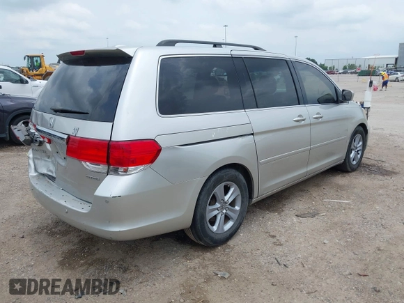 2009 Honda Odyssey Touring z VIN 5FNRL38979B052923, wystawiony jako IAAI lot #42427207 z przebiegiem 201 483 mil mil oraz . Historia ofert i sprzedaży dostępna na DreamBid. Obrazek 4.