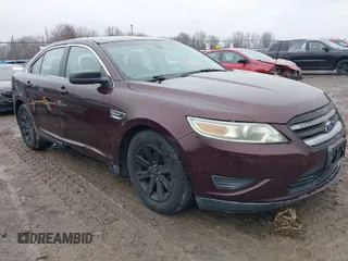 2011 Ford Taurus SE with VIN 1FAHP2DW7BG136988, listed as a IAAI auction lot 42002512 with 145,847 mi miles. Bid and sale history available at carsss.com. Image 1.