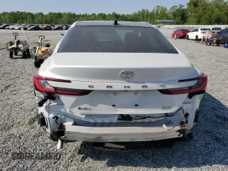 2025 Toyota Camry LE z VIN 4T1DAACK9SU054048, wystawiony jako Copart lot #53659075 z przebiegiem 3 568 mil mil oraz Szkoda całkowita • Salvage title. Historia ofert i sprzedaży dostępna na DreamBid. Obrazek 6.
