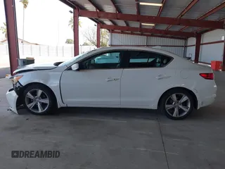 2014 Acura ILX Technology with VIN 19VDE1F73EE005200, listed as a IAAI auction lot 41854914 with 106,929 mi miles and . Bid and sale history available at DreamBid. Image 14.