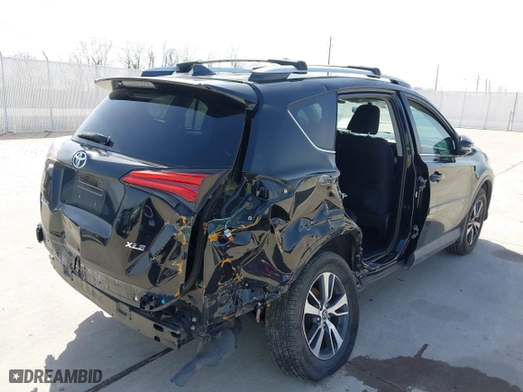 2016 Toyota RAV4 XLE with VIN 2T3WFREV9GW292772, listed as a IAAI auction lot 41727898 with 117,922 mi miles. Bid and sale history available at carsss.com. Image 6.