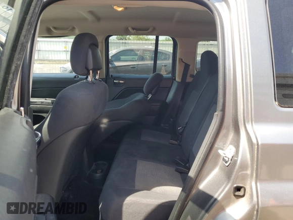 2011 Jeep Patriot Sport with VIN 1J4NT1GB6BD287389, listed as a Copart auction lot 56495085 with 188,650 mi miles and Salvage title. Bid and sale history available at DreamBid. Image 11.