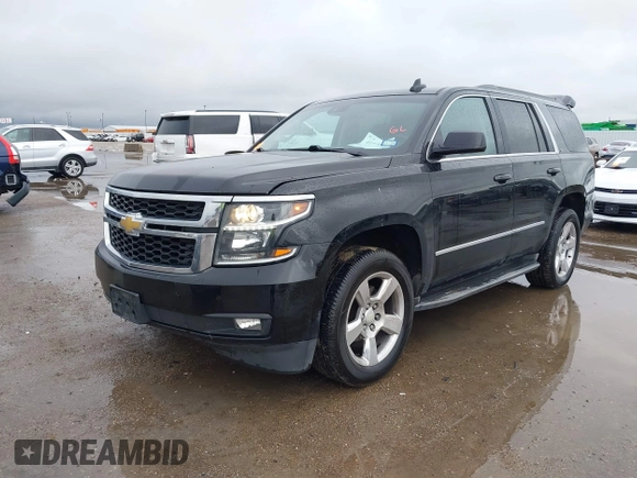 2015 Chevrolet Tahoe LT with VIN 1GNSCBKC2FR632139, listed as a IAAI auction lot 41553087 with 142,775 mi miles and . Bid and sale history available at DreamBid. Image 17.