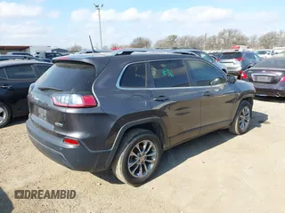 2020 Jeep Cherokee Altitude with VIN 1C4PJLLB5LD580742, listed as a IAAI auction lot 41483128 with 77,127 mi miles. Bid and sale history available at carsss.com. Image 4.