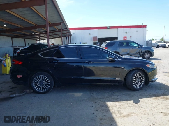 2017 Ford Fusion Energi SE with VIN 3FA6P0PU4HR380184, listed as a IAAI auction lot 42099750 with 126,175 mi miles. Bid and sale history available at carsss.com. Image 14.