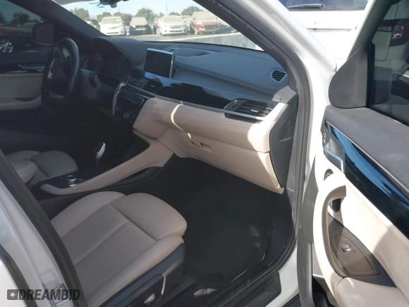 2020 BMW X2 sDrive28i with VIN WBXYH9C01L5P15004, listed as a IAAI auction lot 41128060 with 86,052 mi miles. Bid and sale history available at carsss.com. Image 5.