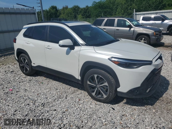 2023 Toyota Corolla Cross Hybrid S with VIN 7MUFBABG5PV008595, listed as a Copart auction lot 60002585 with 9,052 mi miles and Salvage title. Bid and sale history available at DreamBid. Image 4.