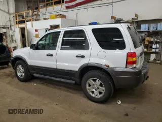 2006 Ford Escape XLT with VIN 1FMCU03106KC14923, listed as a Copart auction lot 52727095 with 126,842 mi miles and Salvage Title. Bid and sale history available at DreamBid. Image 2.