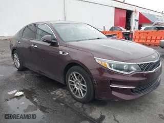 2016 Kia Optima EX with VIN 5XXGU4L31GG004714, listed as a IAAI auction lot 41183230 with 108,084 mi miles. Bid and sale history available at carsss.com. Image 1.