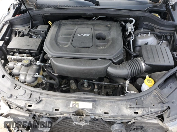 2018 Dodge Durango GT z VIN 1C4RDHDGXJC213152, wystawiony jako Copart lot #56956595 z przebiegiem 162 507 mil mil oraz Szkoda całkowita • Salvage title. Historia ofert i sprzedaży dostępna na DreamBid. Obrazek 12.