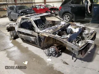 1986 Pontiac Fiero z VIN 1G2PE37R7GP274467, wystawiony jako Copart lot #44980195 z przebiegiem Nie podano mil oraz Szkody całkowita. Historia ofert i sprzedaży dostępna na DreamBid. Obrazek 4.