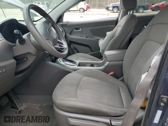 2012 Kia Sportage LX with VIN KNDPBCA26C7227327, listed as a Copart auction lot 53159915 with Not provided miles and Salvage title. Bid and sale history available at DreamBid. Image 7.