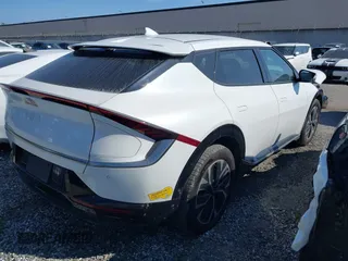 2022 Kia EV6 Wind with VIN KNDC3DLCXN5033602, listed as a IAAI auction lot 41489710 with 81,927 mi miles. Bid and sale history available at carsss.com. Image 4.