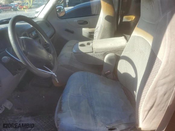 1999 Ford F-150 Work Series with VIN 1FTZF1727XKC14422, listed as a Copart auction lot 86624794 with 0 mi miles and Salvage Title. Bid and sale history available at carsss.com. Image 7.