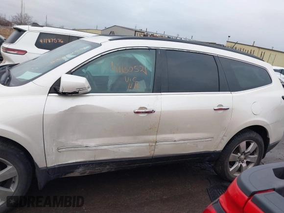 2014 Chevrolet Traverse LTZ z VIN 1GNKRJKDXEJ263349, wystawiony jako IAAI lot #41180521 z przebiegiem 141 564 mil mil oraz . Historia ofert i sprzedaży dostępna na DreamBid. Obrazek 13.