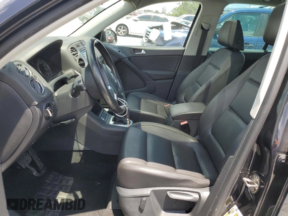2014 Volkswagen Tiguan SE z VIN WVGAV3AX8EW613762, wystawiony jako Copart lot #61385765 z przebiegiem 167 278 mil mil oraz Czysty tytuł • Clean title. Historia ofert i sprzedaży dostępna na DreamBid. Obrazek 7.