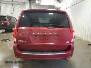 2014 Dodge Grand Caravan SXT z VIN 2C4RDGCG2ER239110, wystawiony jako Copart lot #57247855 z przebiegiem 94 126 mil mil oraz Nie do naprawy. Historia ofert i sprzedaży dostępna na DreamBid. Obrazek 6.