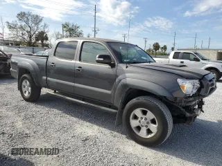 2014 Toyota Tacoma PreRunner with VIN 3TMKU4HN4EM040297, listed as a Copart auction lot 86418894 with 111,626 mi miles and Salvage title. Bid and sale history available at DreamBid. Image 4.