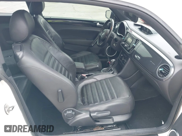2012 Volkswagen Beetle Turbo with VIN 3VWVA7AT3CM650301, listed as a IAAI auction lot 41525503 with Not Provided miles and . Bid and sale history available at DreamBid. Image 5.