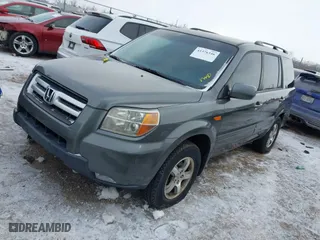2007 Honda Pilot EX with VIN 2HKYF18427H513083, listed as a IAAI auction lot 41376346 with 301,841 mi miles. Bid and sale history available at carsss.com. Image 17.