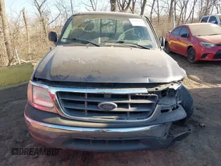 2003 Ford F-150 XL with VIN 2FTRX18WX3CB01433, listed as a IAAI auction lot 41768388 with 170,357 mi miles. Bid and sale history available at carsss.com. Image 12.