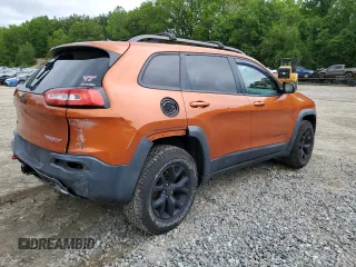 2016 Jeep Cherokee Trailhawk with VIN 1C4PJMBS2GW255368, listed as a Copart auction lot 59010305 with 105,667 mi miles and Salvage title. Bid and sale history available at DreamBid. Image 3.