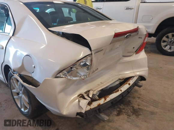 2012 Ford Fusion SEL with VIN 3FAHP0JGXCR128976, listed as a IAAI auction lot 41721468 with 115,277 mi miles. Bid and sale history available at carsss.com. Image 6.