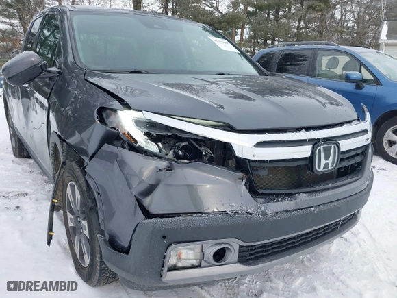 2017 Honda Ridgeline RTL-E with VIN 5FPYK3F75HB035253, listed as a IAAI auction lot 41292668 with 115,581 mi miles. Bid and sale history available at carsss.com. Image 6.