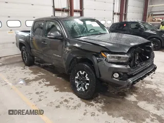 2021 Toyota Tacoma SR z VIN 3TMCZ5AN2MM444249, wystawiony jako IAAI lot #41942146 z przebiegiem 59 429 mil mil oraz . Historia ofert i sprzedaży dostępna na DreamBid. Obrazek 1.