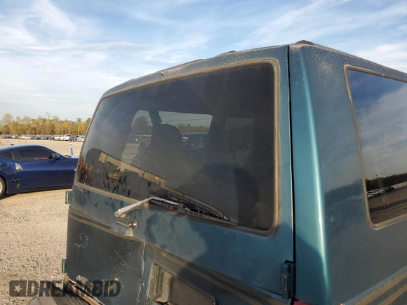 1998 Chevrolet Astro with VIN 1GNEL19WXWB120466, listed as a Copart auction lot 80929504 with 262,413 mi miles and Salvage Title. Bid and sale history available at carsss.com. Image 11.