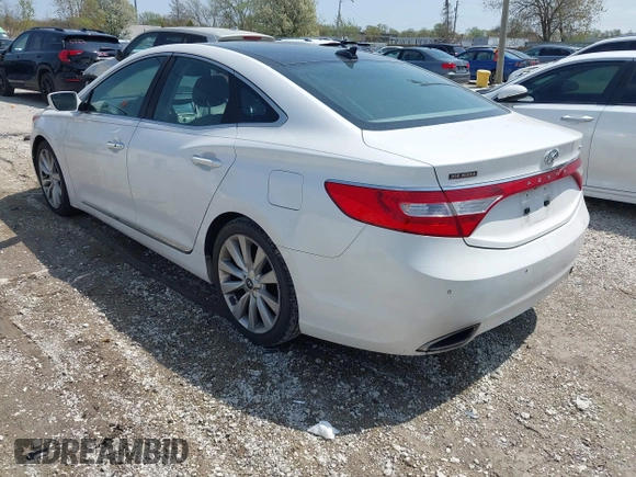 2014 Hyundai Azera Limited z VIN KMHFH4JG2EA373608, wystawiony jako IAAI lot #42125063 z przebiegiem 121 111 mil mil oraz . Historia ofert i sprzedaży dostępna na DreamBid. Obrazek 3.