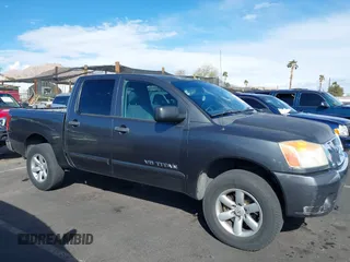 2010 Nissan Titan XE with VIN 1N6BA0EJ5AN304045, listed as a IAAI auction lot 41794718 with 297,551 mi miles. Bid and sale history available at carsss.com. Image 17.