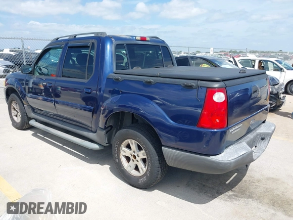 2005 Ford Explorer Sport Trac XLS z VIN 1FMZU67K05UB36386, wystawiony jako IAAI lot #42449876 z przebiegiem 161 181 mil mil oraz . Historia ofert i sprzedaży dostępna na DreamBid. Obrazek 3.