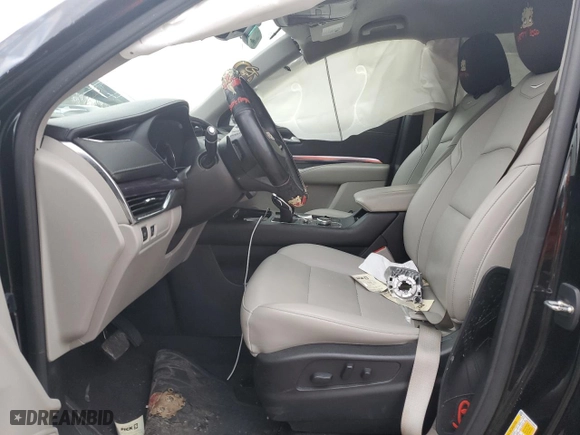 2023 Cadillac XT4 FWD Luxury with VIN 1GYAZAR45PF218684, listed as a Copart auction lot 46483515 with 74,920 mi miles and Salvage Title. Bid and sale history available at carsss.com. Image 7.