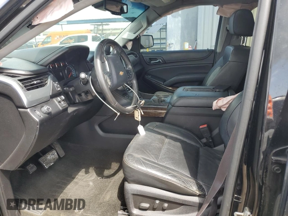 2016 Chevrolet Tahoe LT with VIN 1GNSCBKC0GR210825, listed as a Copart auction lot 58483815 with 199,945 mi miles and Salvage title. Bid and sale history available at DreamBid. Image 7.