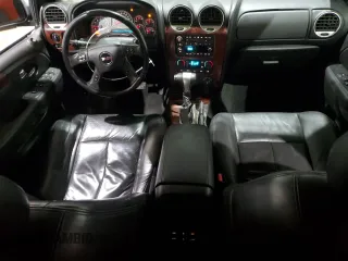 2007 GMC Envoy SLE z VIN 1GKDT13S172268778, wystawiony jako Copart lot #86169804 z przebiegiem 109 164 mil mil oraz Szkoda całkowita • Salvage title. Historia ofert i sprzedaży dostępna na DreamBid. Obrazek 8.