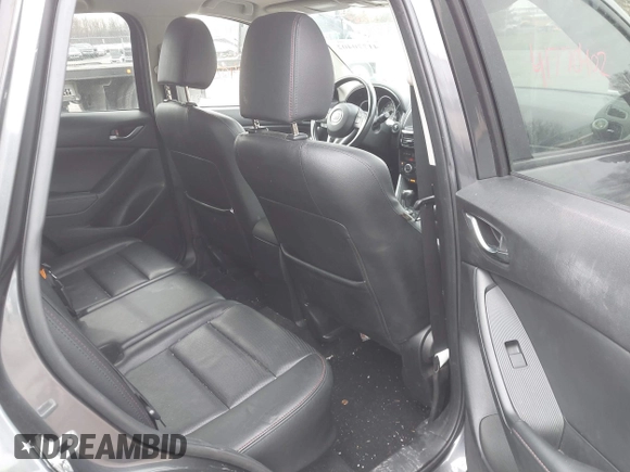 2014 Mazda CX-5 Grand Touring with VIN JM3KE4DY4E0343863, listed as a IAAI auction lot 41770402 with 117,615 mi miles. Bid and sale history available at carsss.com. Image 8.