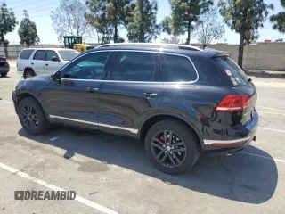2016 Volkswagen Touareg Sport with VIN WVGEF9BP0GD007399, listed as a Copart auction lot 53990675 with 110,439 mi miles and Salvage Title. Bid and sale history available at DreamBid. Image 2.