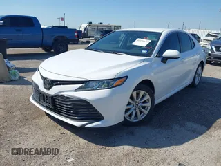 2019 Toyota Camry LE with VIN 4T1B11HK9KU825107, listed as a IAAI auction lot 41971159 with 15,802 mi miles and . Bid and sale history available at DreamBid. Image 2.