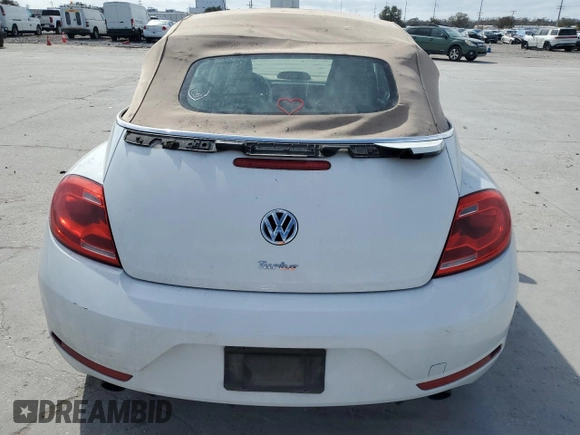 2014 Volkswagen Beetle with VIN 3VW7S7AT5EM815435, listed as a Copart auction lot 43213645 with 109,082 mi miles and Salvage Title. Bid and sale history available at DreamBid. Image 6.