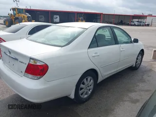 2005 Toyota Camry LE with VIN 4T1BF32K55U083752, listed as a IAAI auction lot 42145407 with 229,838 mi miles and . Bid and sale history available at DreamBid. Image 4.