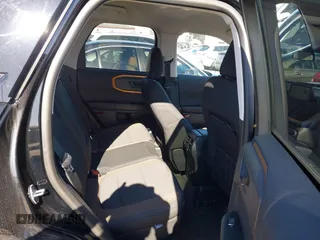 2023 Ford Bronco Sport Badlands z VIN 3FMCR9D95PRD26169, wystawiony jako IAAI lot #41723643 z przebiegiem 21 181 mil mil oraz . Historia ofert i sprzedaży dostępna na DreamBid. Obrazek 8.