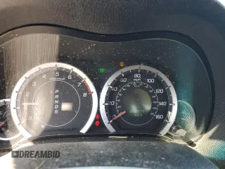 2009 Acura TSX z VIN JH4CU266X9C010134, wystawiony jako Copart lot #52143775 z przebiegiem 260 019 mil mil oraz Szkoda całkowita • Salvage title. Historia ofert i sprzedaży dostępna na DreamBid. Obrazek 9.