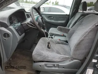 2003 Honda Odyssey EX with VIN 2HKRL18603H008412, listed as a Copart auction lot 87502365 with 352,773 mi miles and Salvage Title. Bid and sale history available at DreamBid. Image 7.