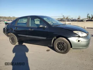 2000 Ford Focus LX with VIN 1FAFP33P8YW216936, listed as a Copart auction lot 83038404 with 120,298 mi miles and Salvage Title. Bid and sale history available at DreamBid. Image 4.