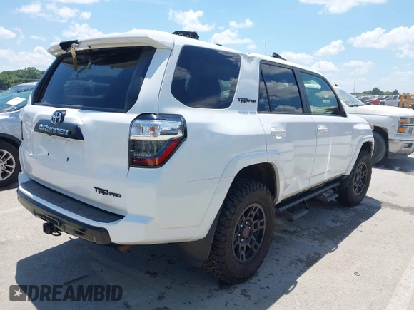 2018 Toyota 4Runner SR5 with VIN JTEBU5JRXJ5595186, listed as a IAAI auction lot 42607713 with 83,592 mi miles and . Bid and sale history available at DreamBid. Image 4.