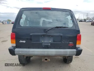 1998 Jeep Cherokee Sport with VIN 1J4FJ68S6WL188802, listed as a Copart auction lot 52094005 with 199,586 mi miles and Salvage Title. Bid and sale history available at carsss.com. Image 6.