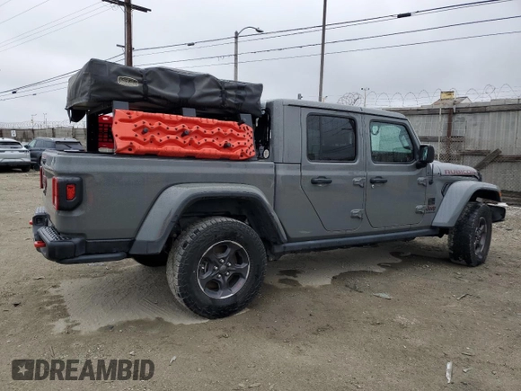 2021 Jeep Gladiator Rubicon with VIN 1C6JJTBG5ML615653, listed as a Copart auction lot 51297795 with 48,918 mi miles and Salvage title. Bid and sale history available at DreamBid. Image 3.